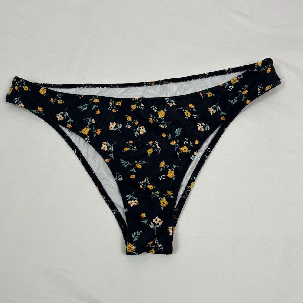 Black bikini bottoms with orange floral print
